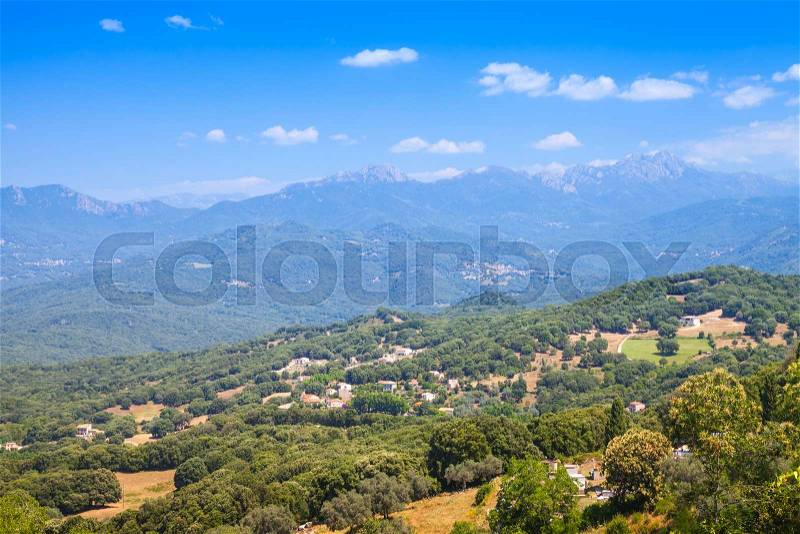 Rural landscape with small villages and mountains. Corsica, France, stock photo