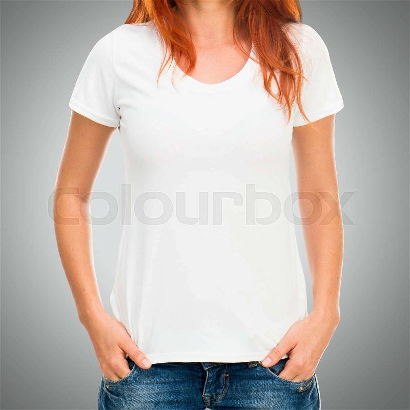 Girl\'s body in white t-shirt template on gray background, stock photo