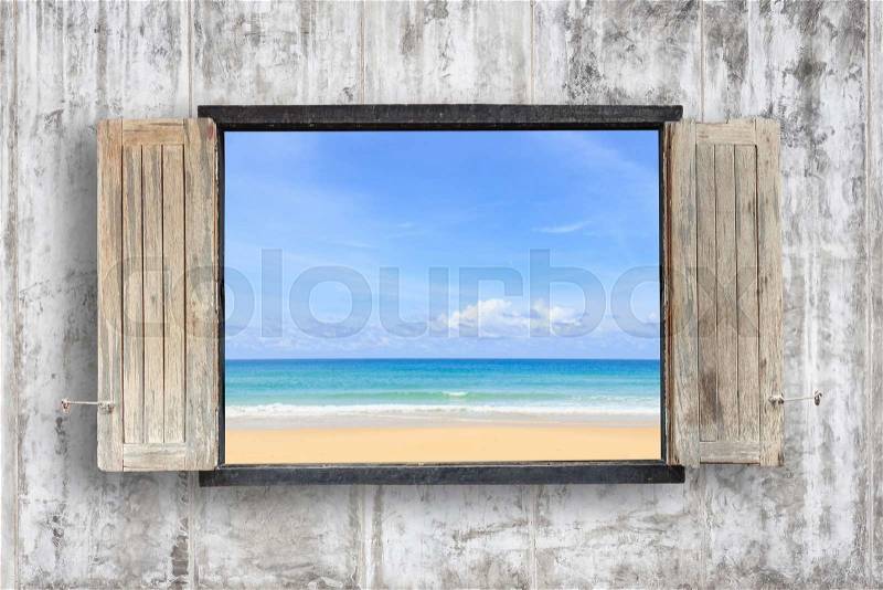 Old wooden windows frame on cement wall and view of tropical sea, stock photo