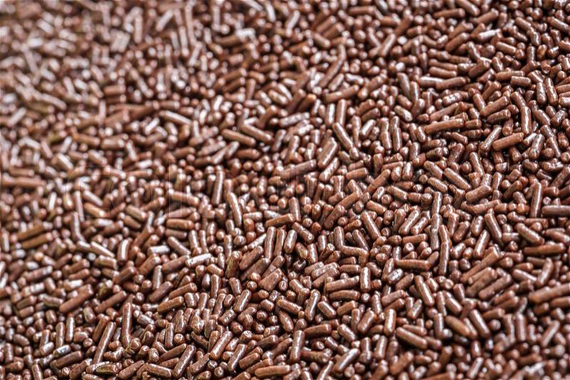 Macro pattern of chocolate sprinkles texture and background, stock photo