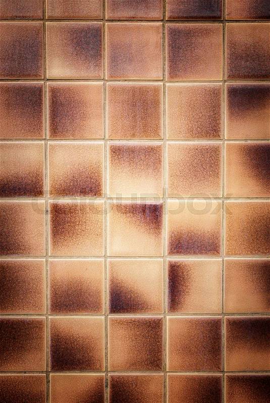 Close up old pattern brown ceramic bathroom wall tile ...