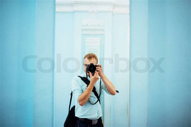 Photographer in a mirror, stock photo