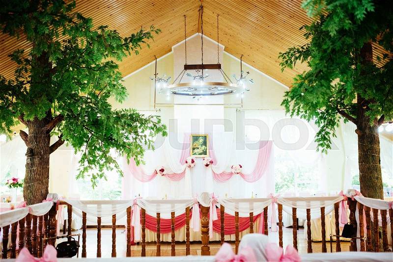 Interior of a wedding tent decoration ready for guests, stock photo