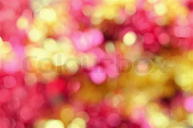 Christmas shiny bokeh in yellow and red colors, stock photo