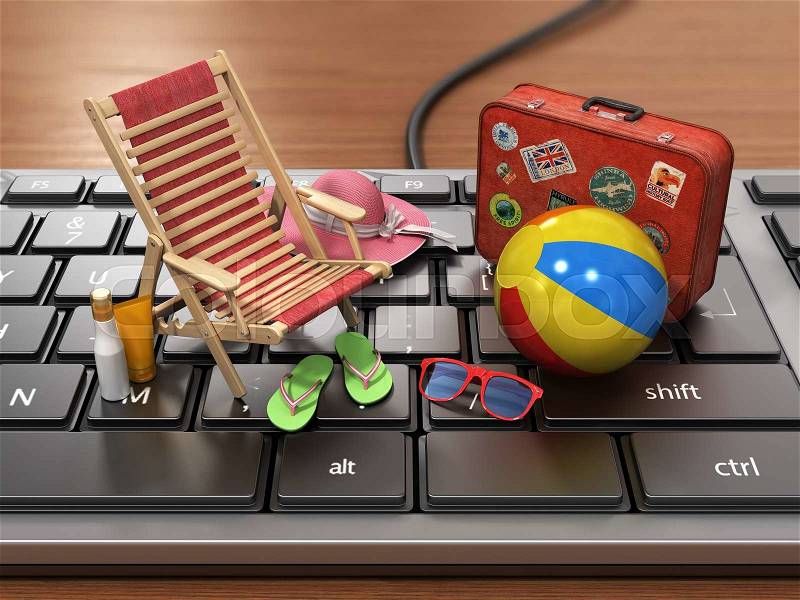 Recreation concept. Thoughts about the rest on the workplace. Sunbed, sunglass,cap, beach shoes, sun cream and suitcase for travel on the keyboard, stock photo