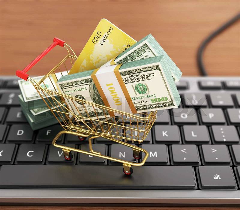 US hundred dollar bills and shopping cart with credit card on the modern computer keyboard. Dollars stack, stock photo