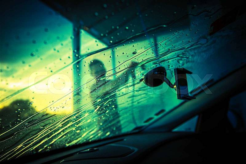 Car Windshield Cleaning. Car Cleaning in the Car Wash. Inside View, stock photo