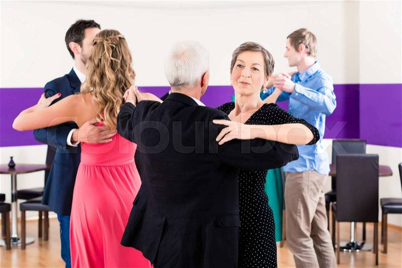 Group of people dancing in dance class having fun, stock photo