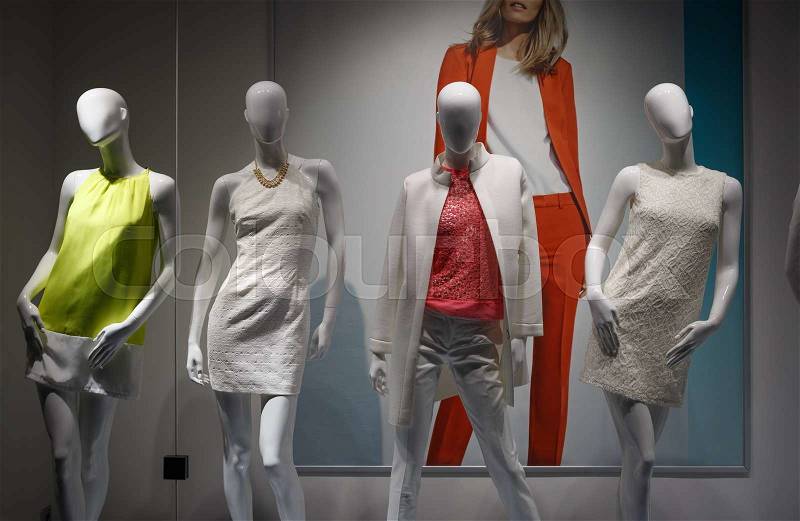 Fashion concept. Photo four elegant female mannequins demonstrating clothes, stock photo