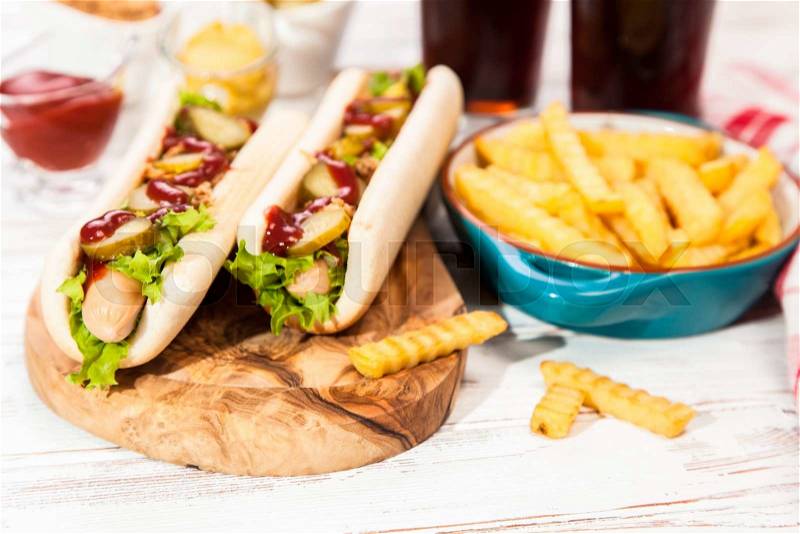 Hot dogs and french fries, stock photo