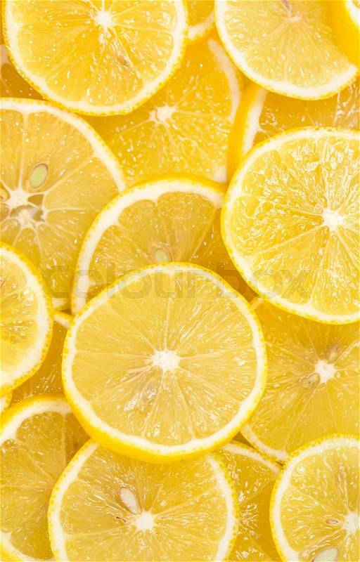 Background of sliced ripe lemons organic, pattern, stock photo