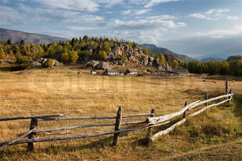 Farm Fence and old farm in East Kazakhstan, Altai mountains , stock photo