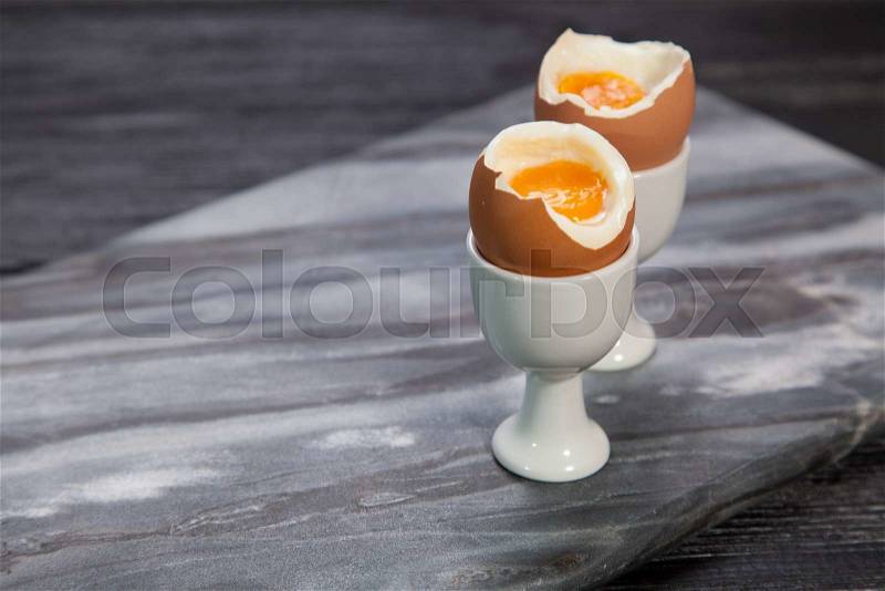 Fresh boiled eggs on marble background, stock photo