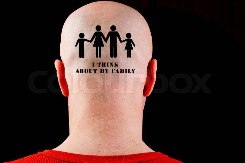 Text on the bald head I think about my family, stock photo