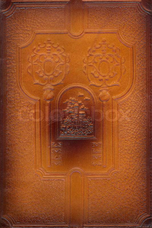 Brown leathercraft tooled vintage book cover with texture and border, stock photo