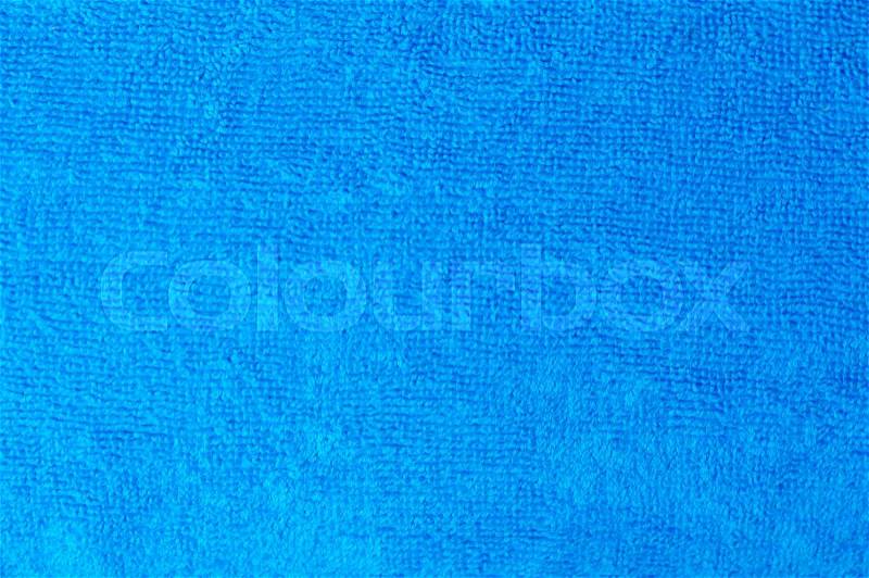 Texture of a blue cotton towel as a background, stock photo