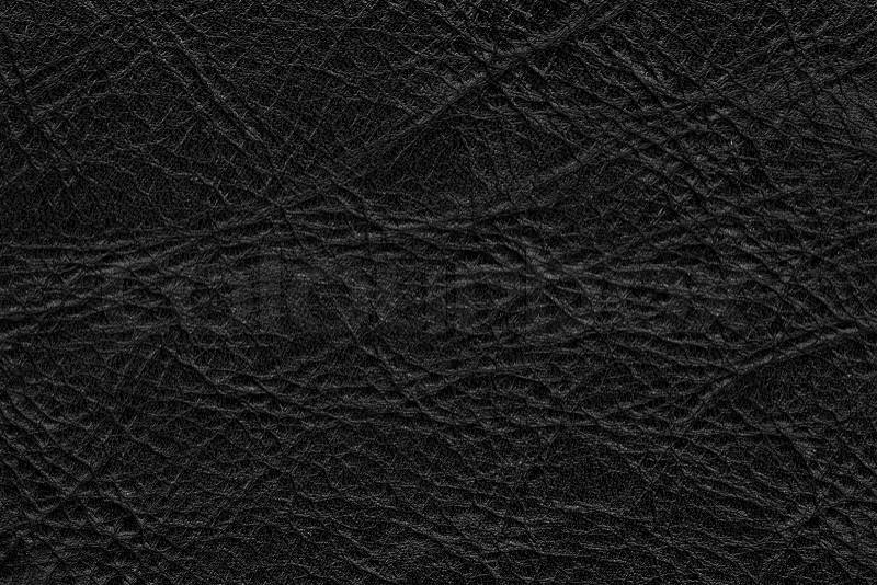 Vintage stained bumpy grained leather background, stock photo