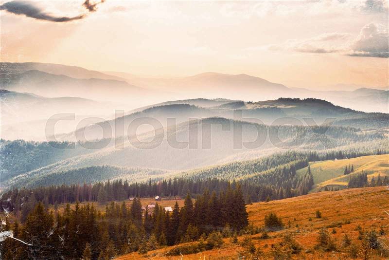 Fog over the mountains. Vintage effect, stock photo