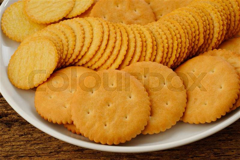 Salty crackers on plate, stock photo
