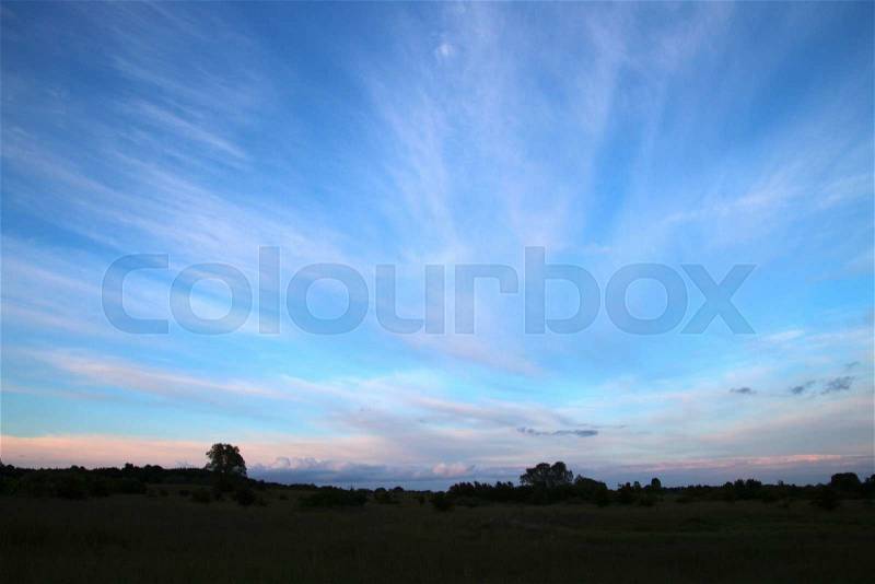 Clouds on a late night blue sky, stock photo