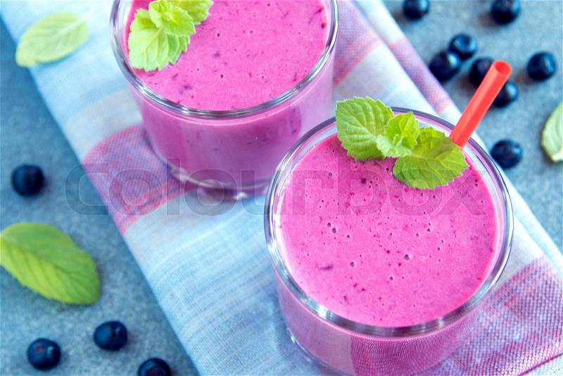 Blueberry smoothie with mint and raw berries, organic healthy raw food, stock photo