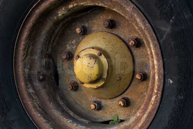 Close up to big heavy tire and wheel, stock photo