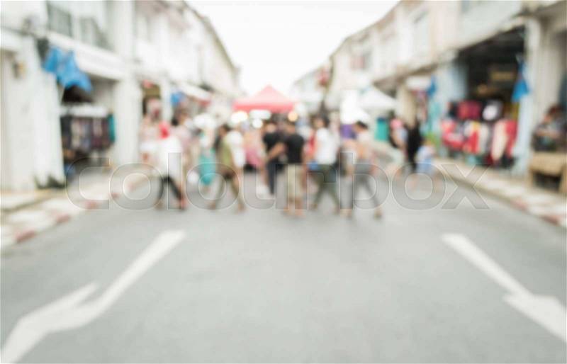 Abstract of blurred people walking on the street, stock photo