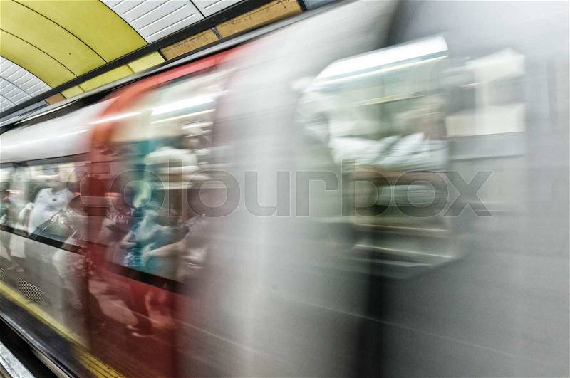 Blurred image of London underground train moving fast, stock photo