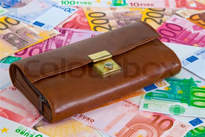 Purse with euro banknotes as background, stock photo