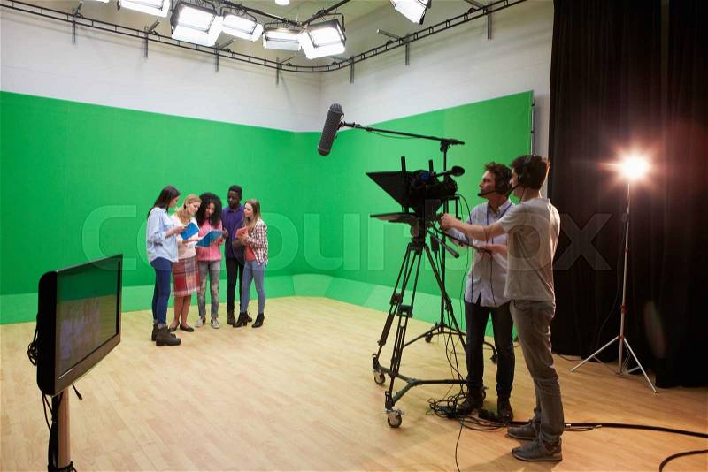 Students On Media Studies Course In TV Studio, stock photo