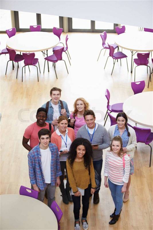Overhead View Of College Students And Tutors In Cafeteria, stock photo