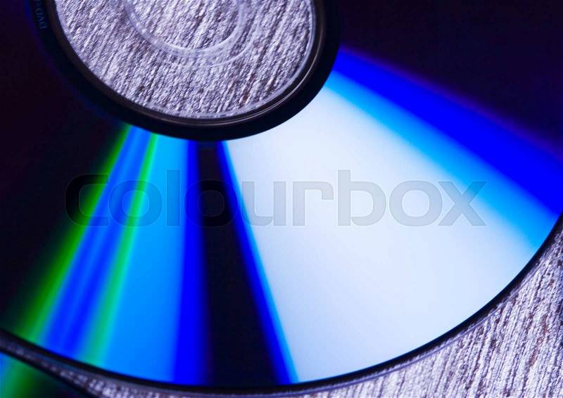 Disks on puzzles, vivid colors, natural tone, stock photo