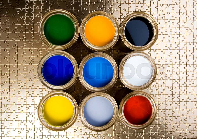Paint buckets, paint and brush, bright colorful tone concept, stock photo