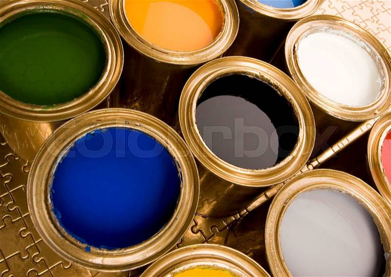 Paint buckets, paint and brush, bright colorful tone concept, stock photo