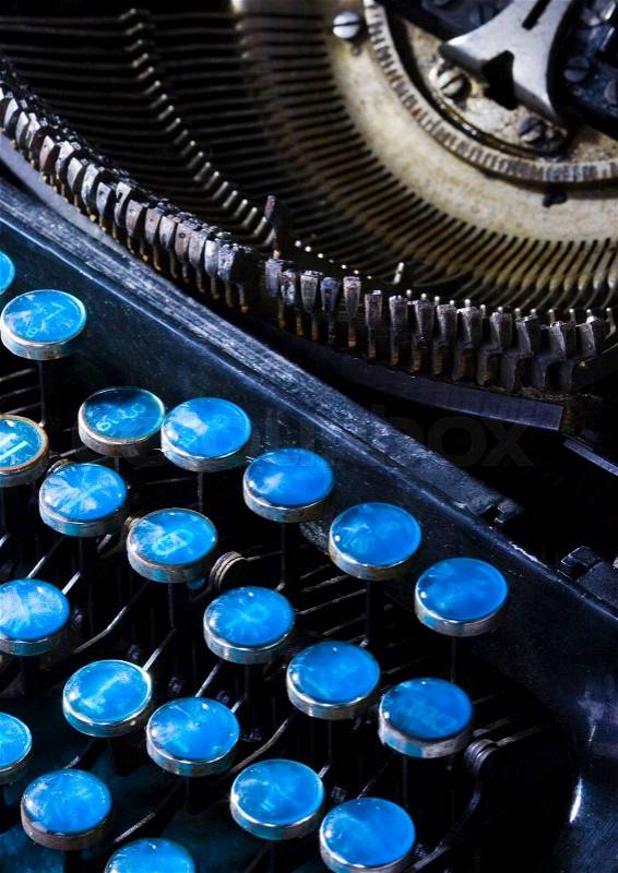 Old retro typewriter on wooden desk, stock photo