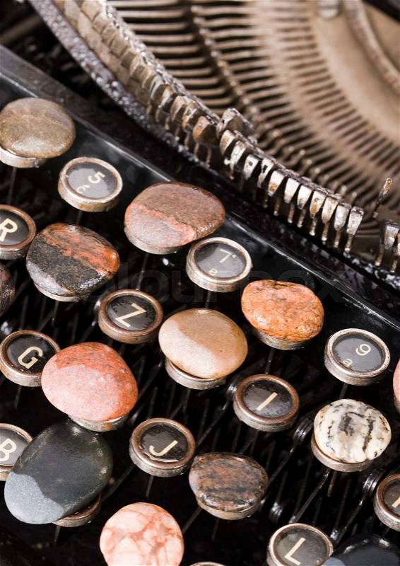 Old retro typewriter on wooden desk, stock photo