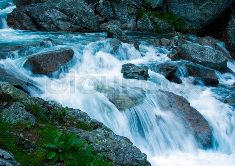 Mountain waterfall, pure nature beautiful landscape, stock photo