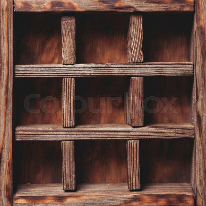 Vintage shelf stand on the wooden background, stock photo