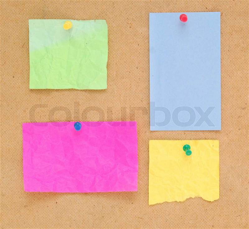Empty color notes on wooden background, stock photo
