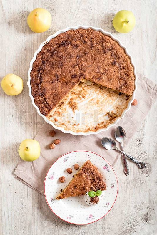 Homemade pear pie with nougat served in the plate,from above, stock photo