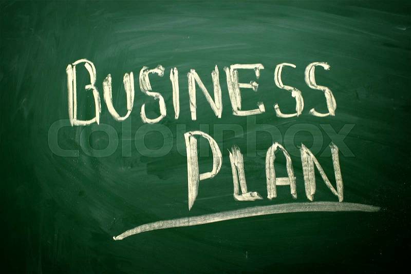 Business Plan title written with chalk on blackboard , stock photo