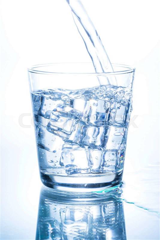 Pouring Water into Glass, stock photo