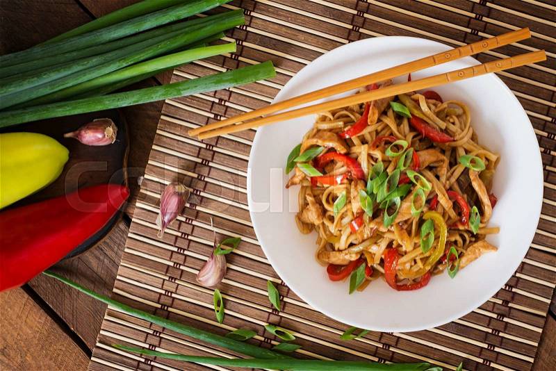 Don noodles with chicken and peppers - Japanese cuisine, stock photo