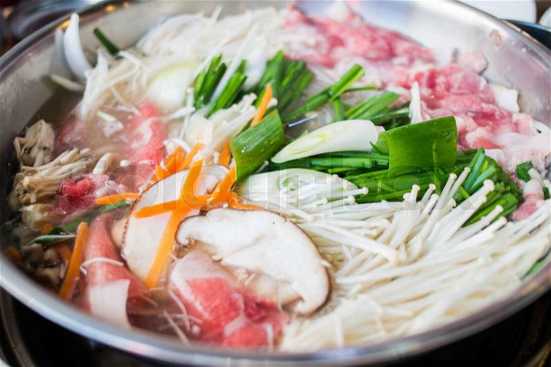Korean shabu - slice pork and vegetable boil in soup, stock photo