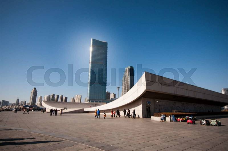 Dalian, China - January 19, 2015 : People enjoy the activities at Xinghai Square.The Square covers total area of 1.1 million square metre, making it the largest city square in the world, stock photo