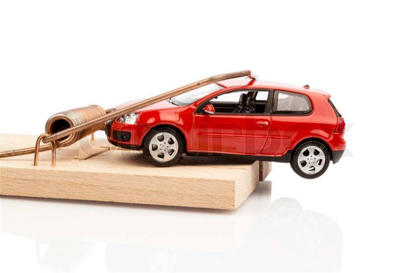 A model car in a mousetrap, symbolfoto for car expenses and liabilities, stock photo
