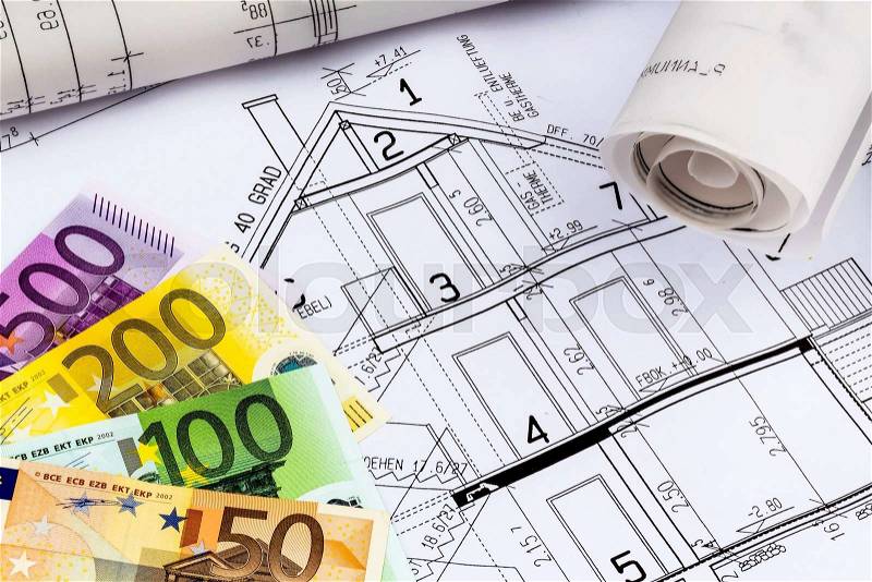 A blueprint of an architect with euro money. symbolic photo for financing and planning of a new house, stock photo