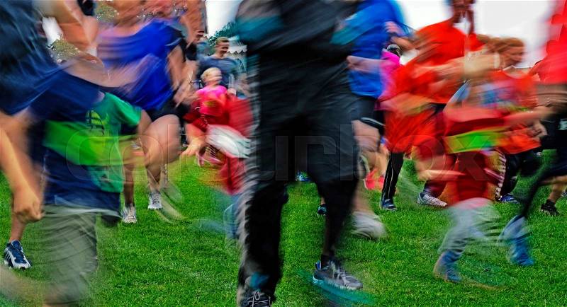 Crowd of people running just after start - Blurred competition picture, stock photo