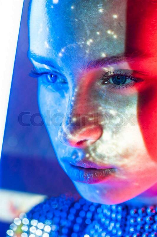Close up portrait of art color woman face.Full lips.Bright lights, stock photo
