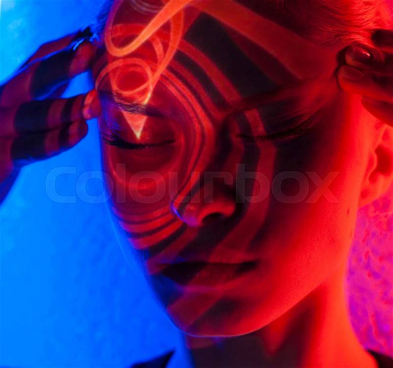 Close up portrait of art color woman face.Full lips.Bright lights, stock photo